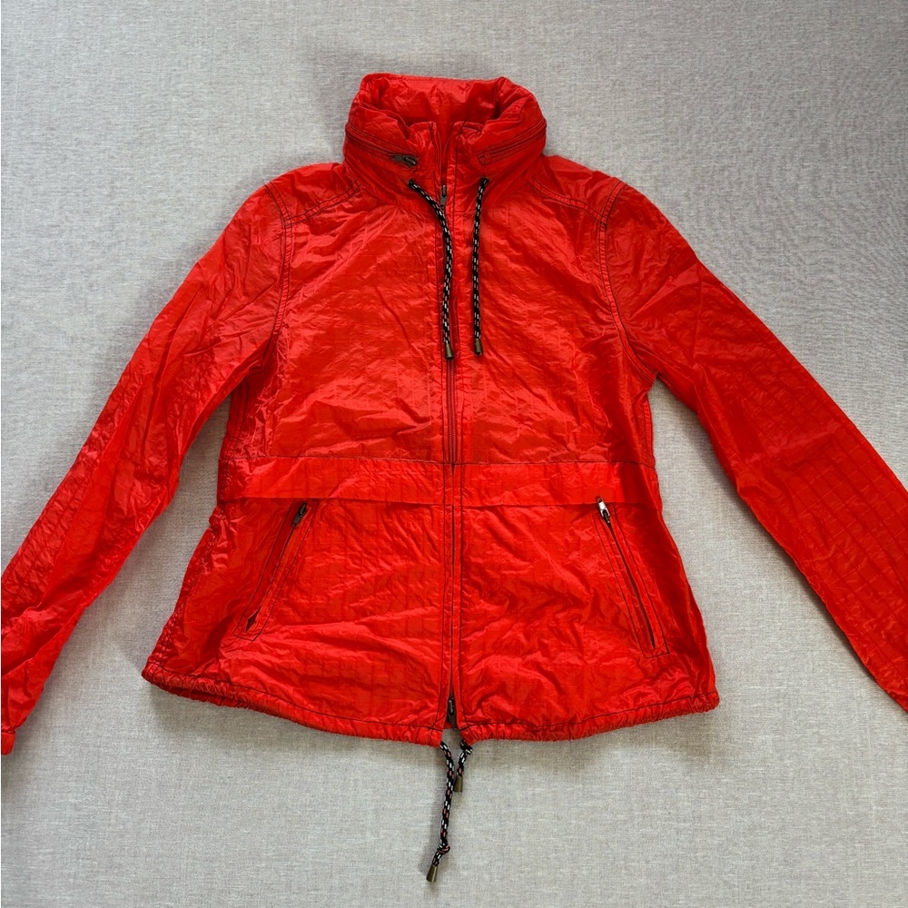 Free People red orange windbreaker jacket.